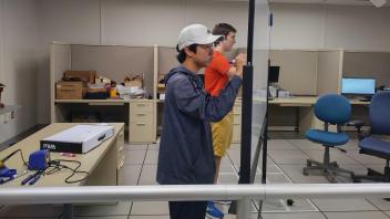Students working on a whiteboard